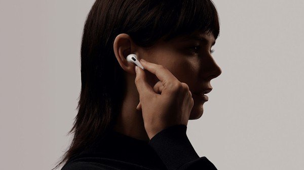A girl with airpod - injoyreview