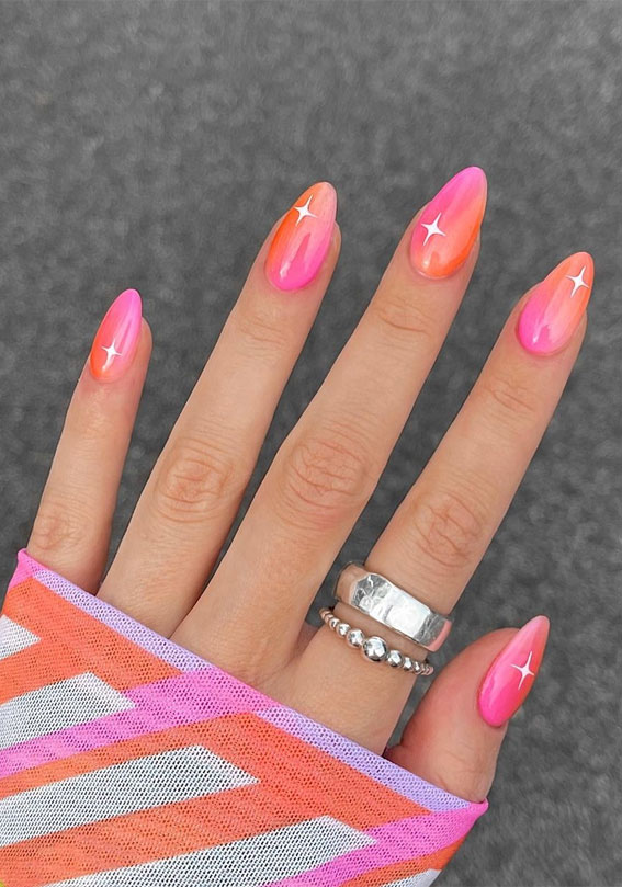 27. Radiance in Motion: A Sunset-Inspired Nail Look